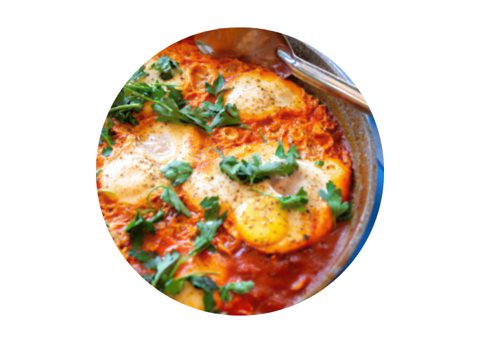 A close up shot of a bowl of shakshuka.